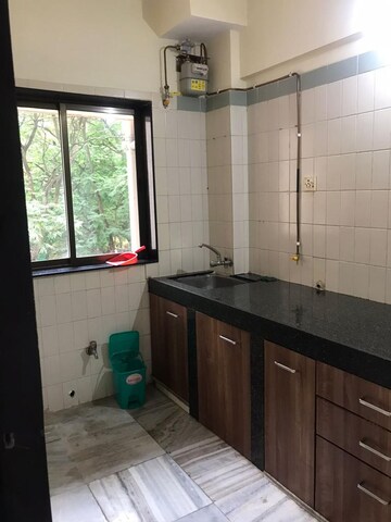 Kitchen in 1 BHK Apartment at Sunbeam Apartments Powai, Powai – for Rent