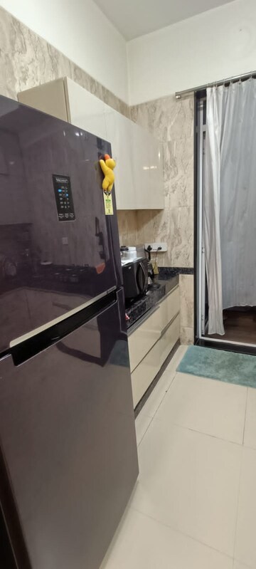 Kitchen in 2 BHK Apartment at Ramesh Nagar – for Rent