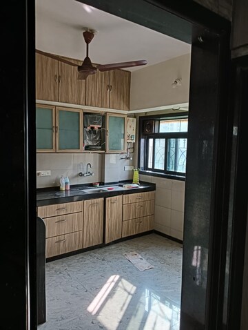 Kitchen in 2 BHK Apartment at Himgiri Lokupvan Phase II CHS Ltd, Vasant Vihar – for Sale