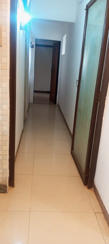 Building Lobby in 2 BHK Apartment at Meera Tower, Andheri West – for Rent