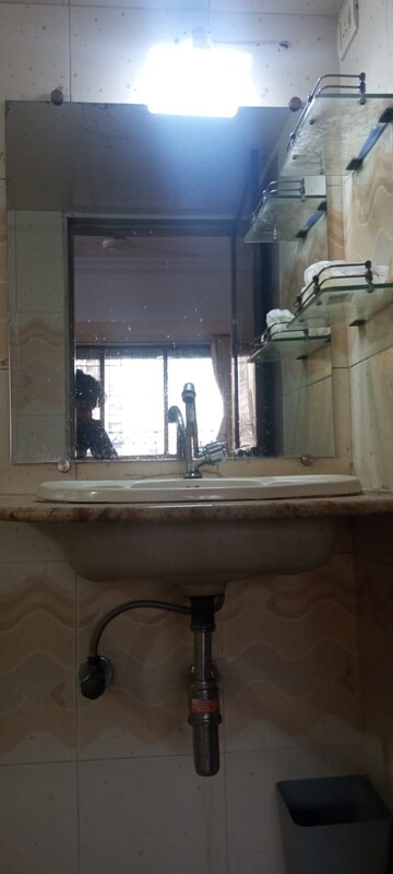 Bathroom in 2 BHK Apartment at Meera Tower, Andheri West – for Rent