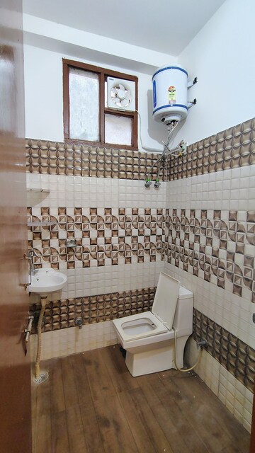 Bathroom in 2 BHK Builder Floor at Hong Kong Bazaar, Sector 57 – for Rent