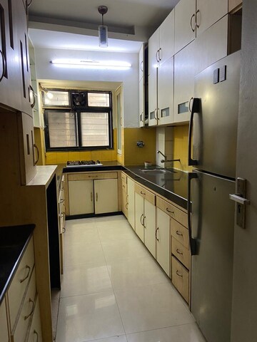Kitchen in 2 BHK Apartment at Serenity Complex, Andheri West – for Rent