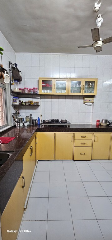 Kitchen in 2 BHK Apartment at Asmita Jyoti CHS, Malad West – for Sale
