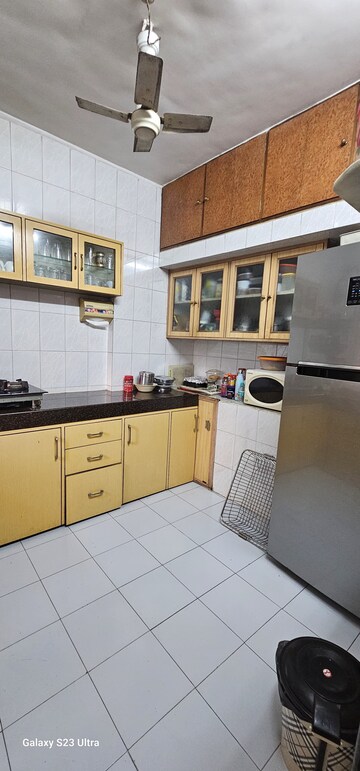Kitchen in 2 BHK Apartment at Asmita Jyoti CHS, Malad West – for Sale
