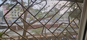Staircase in 2 BHK Apartment at Asmita Jyoti CHS, Malad West – for Sale