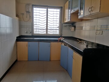 Kitchen in 1 BHK Apartment at Agarwal Trinity Towers, Malad West – for Rent