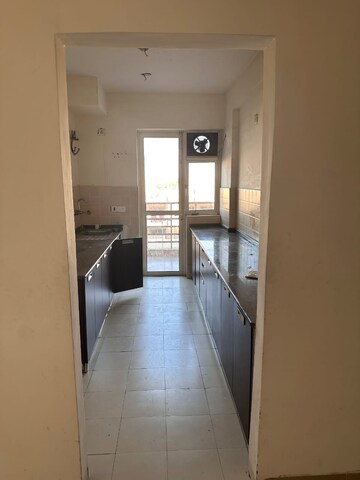 Kitchen in 4 BHK Apartment at Satya The Hermitage, Sector 103 – for Rent