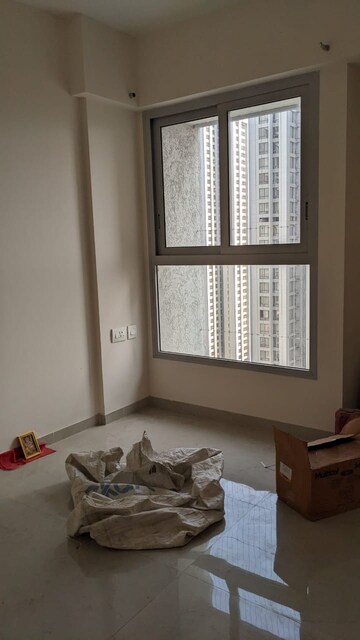 Living Room in 1 BHK Apartment at Piramal Vaikunth, Balkum Pada – for Rent