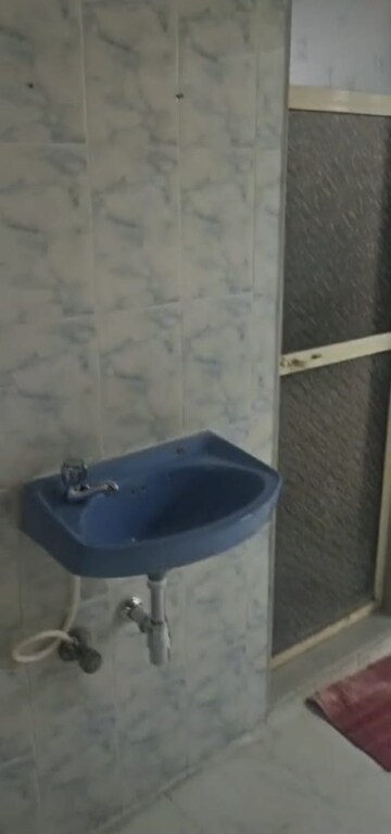 Bathroom in 1 BHK Apartment at Amity Hive 97, Malad East – for Rent