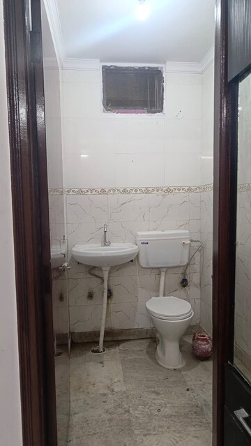 Bathroom in 2 BHK Apartment at Shaheen Bagh – for Sale