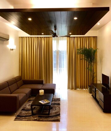 Living Room in 3 BHK Apartment at Defence Colony – for Rent