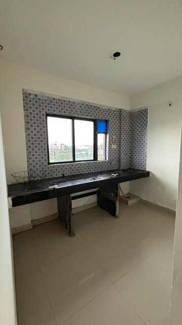 Kitchen in 1 BHK Apartment at RPS TOWNSHIP, Chakan – for Sale