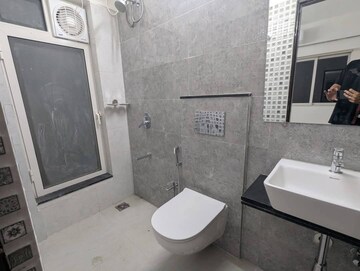 Bathroom in 1 BHK Apartment at Omkar Signet, Malad East – for Rent