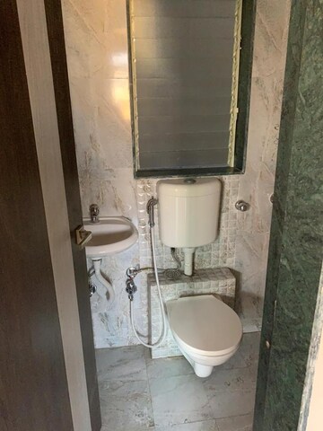 Bathroom in 2 BHK Apartment at Mohan Willows, Badlapur East – for Rent