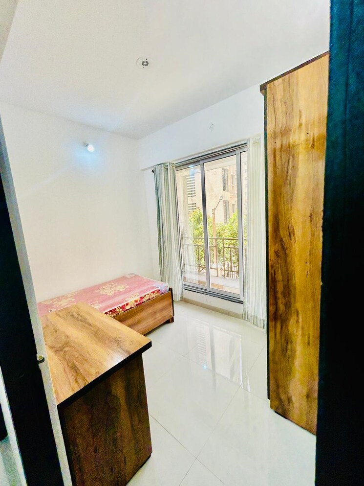 Bedroom, gurukrupa-pg-vatika 2 Bedroom 900 Sq.Ft. Apartment In Badlapur East Thane 8008219