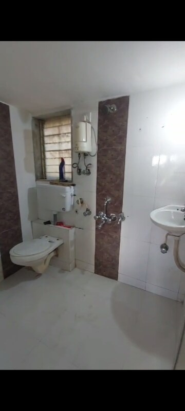Bathroom in 2 BHK Apartment at Balaji Annex, Mira Road – for Sale