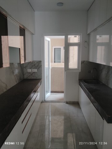 Kitchen in 3 BHK Apartment at ACE Parkway, Sector 150 – for Rent