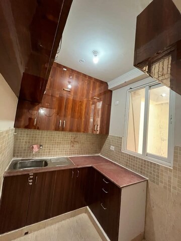 Kitchen in 2 BHK Apartment at Amrapali Golf Homes, Sector 4 Greater Noida – for Rent