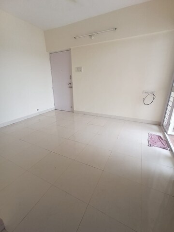 Living Room in 2 BHK Apartment at Vijay Vanaz Pariwar CHS, Kothrud – for Rent