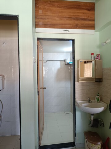 Bathroom in 1 BHK Apartment at Haware Paradise, Muthaval – for Sale