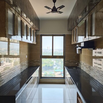Kitchen in 2 BHK Apartment at Rajesh Raj Infinia, Evershine Nagar – for Sale