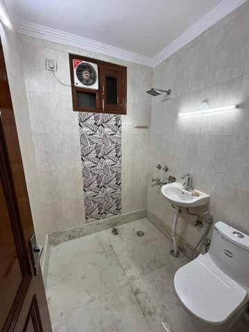 Bathroom in 3 BHK Builder Floor at Malviya Nagar – for Sale