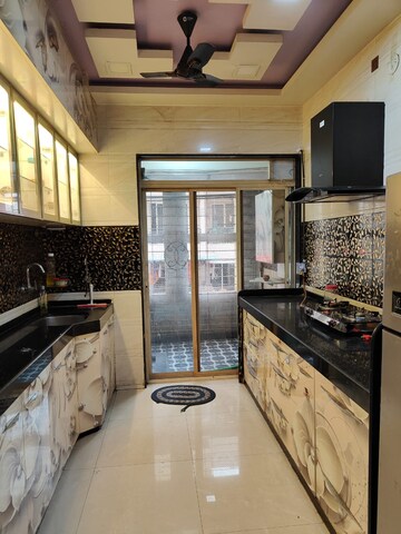 Kitchen in 2 BHK Apartment at Dweepmala Gauri Priya, Kharghar – for Rent