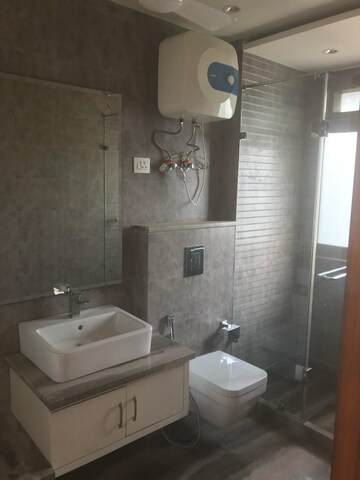 Bathroom in 3 BHK Apartment at Defence Colony – for Rent