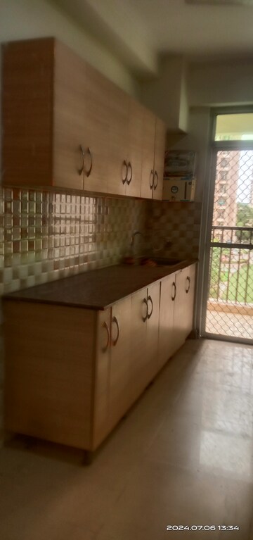 Kitchen in 3 BHK Apartment at AFOWO Raksha Addela, Sector 16c Greater Noida – for Sale