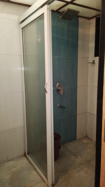 Bathroom in 1.5 BHK Apartment at Mantri Park, Goregaon East – for Rent