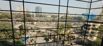 Master Bedroom in 1 BHK Apartment at Chandravadan CHS, Ganeshwadi – for Sale