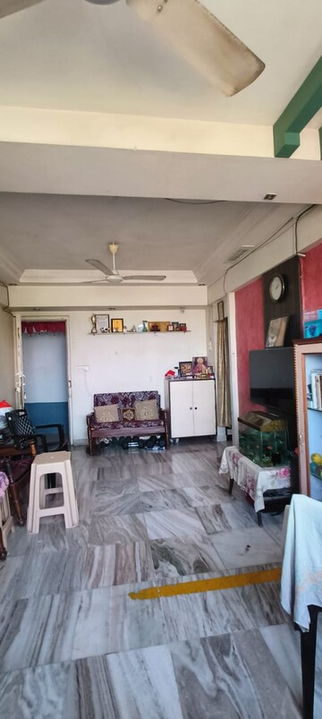 Living Room in 1 BHK Apartment at Chandravadan CHS, Ganeshwadi – for Sale