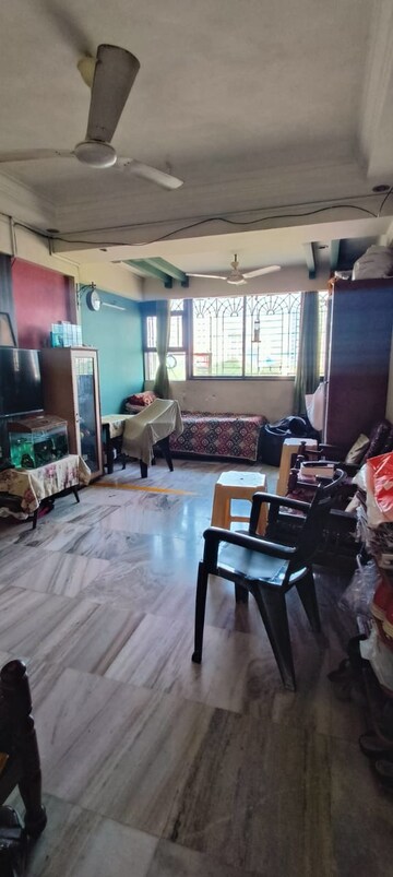 Living Room in 1 BHK Apartment at Chandravadan CHS, Ganeshwadi – for Sale