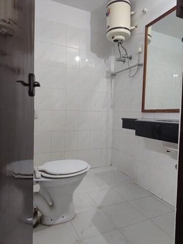 Bathroom in 1 BHK Builder Floor at Ansal Sushant Lok I, Sector 43 – for Rent