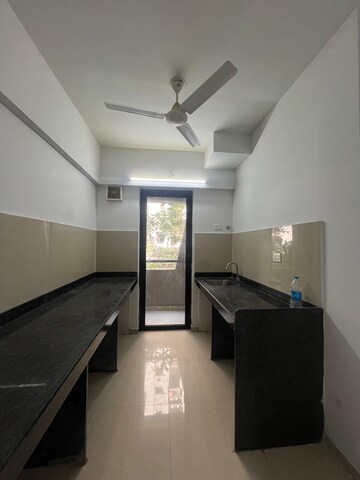 Kitchen in 2.5 BHK Apartment at Lodha Palava Downtown, Dombivli East – for Sale