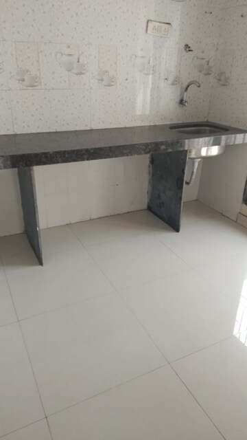 Kitchen in 2 BHK Apartment at Ajinkyan CHS, Kharghar – for Sale