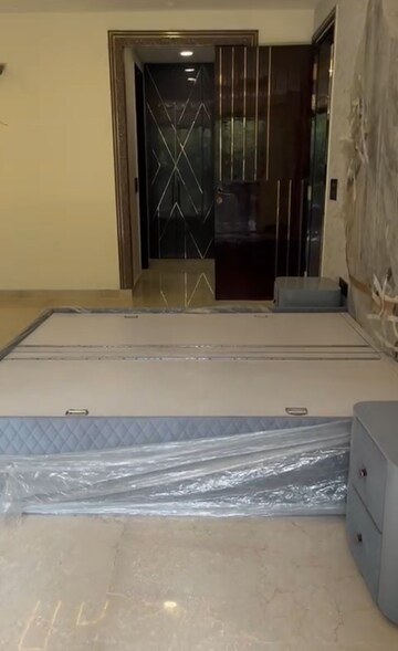 Bedroom in 4 BHK Builder Floor at Ansal Sushant Lok I, Sector 43 – for Rent