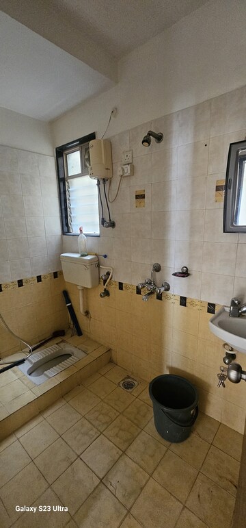 Bathroom in 2 BHK Apartment at Bhoomi Park, Malad West – for Rent