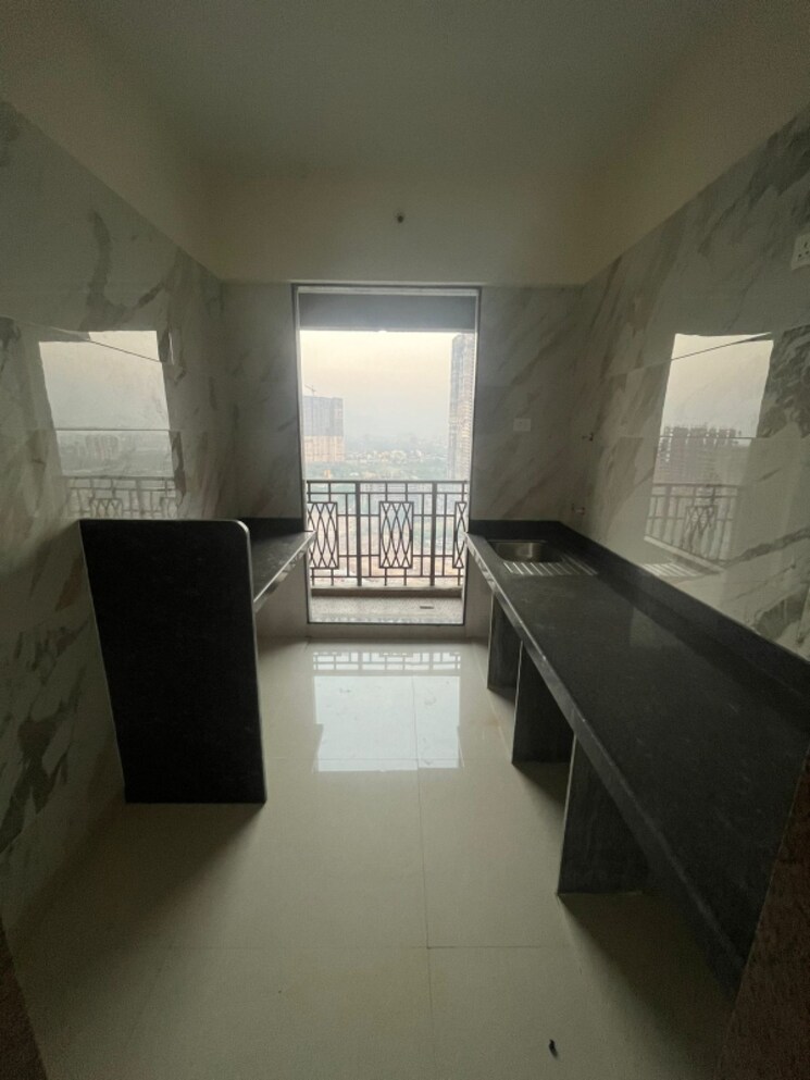 Kitchen, paradise-sai-world-empire 2 Bedroom 878 Sq.Ft. Apartment In Kharghar Navi Mumbai 8009827
