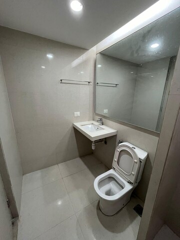 Bathroom in 1 BHK Apartment at Hiranandani Woodstock, Ghodbunder Road – for Rent