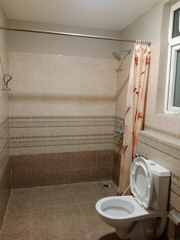 Bathroom in 3 BHK Apartment at Ansals Sushant City – for Rent