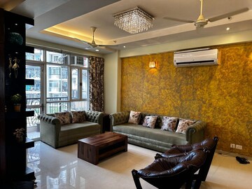 Living Room in 3.5 BHK Apartment at Gardenia Golf City, Sector 75 – for Rent