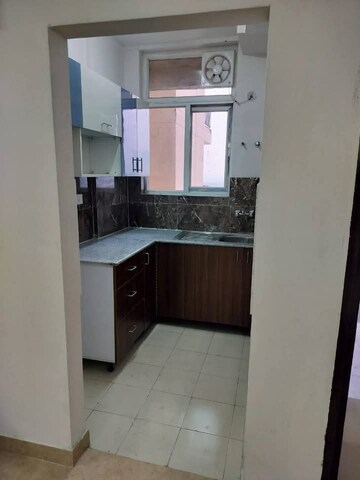 Kitchen in 3 BHK Apartment at Amrapali Riverview, Amrapali Leisure Valley – for Sale