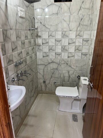 Bathroom in 2 BHK Builder Floor at Dwarka Mor – for Rent
