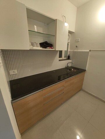 Kitchen in 1 BHK Apartment at Omkar Signet, Malad East – for Rent