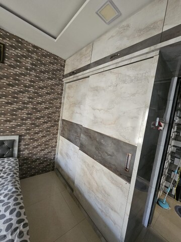 Bedroom in 2 BHK Apartment at Ekta Parks Ville, Virar West – for Rent