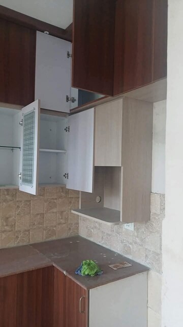 Kitchen in 3 BHK Apartment at Amrapali Golf Homes, Sector 4, Greater Noida – for Sale