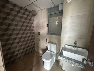 Bathroom in 2 BHK Apartment at Kalpataru Immensa, Kolshet Road – for Rent