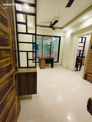Living Room in 1 BHK Apartment at Vardhaman Vatika Navi Mumbai, Shelu – for Sale